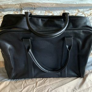 Black faux leather carryon